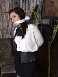 Photo of Amy in bondage.