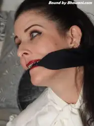 Photo of Caroline Pierce in bondage.