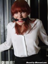 Photo of Kitty Quinzell in bondage.