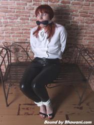 Photo of Kitty Quinzell in bondage.