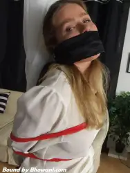 Photo of Lottie LaLay in bondage.