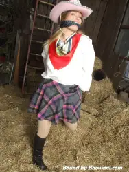 Photo of Lottie LaLay in bondage.