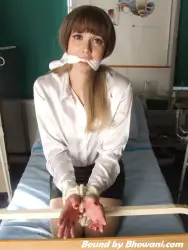 Photo of LilMissyUK in bondage.