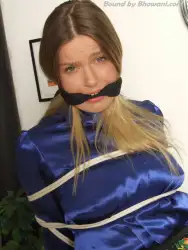 Photo of Lottie LaLay in bondage.