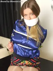 Photo of Lottie LaLay in bondage.