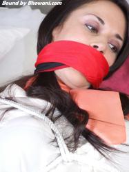Photo of Olivia in bondage.