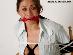 Photo of Roxie Rae in bondage.