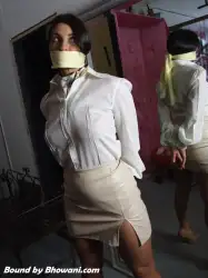 Photo of Sarah Wild in bondage.