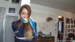 Photo of Liz Rainbow in bondage.