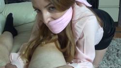 Photo of Liz Rainbow in bondage.