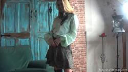 Photo of Lottie LaLay in bondage.