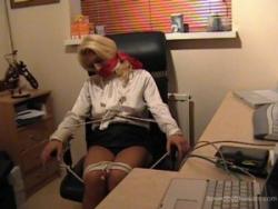 Photo of Lana Cox in bondage.